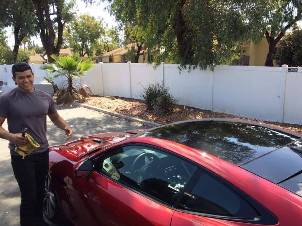 DetailBroski Mobile Detailing Chula Vista hand washing a car at a customer's location