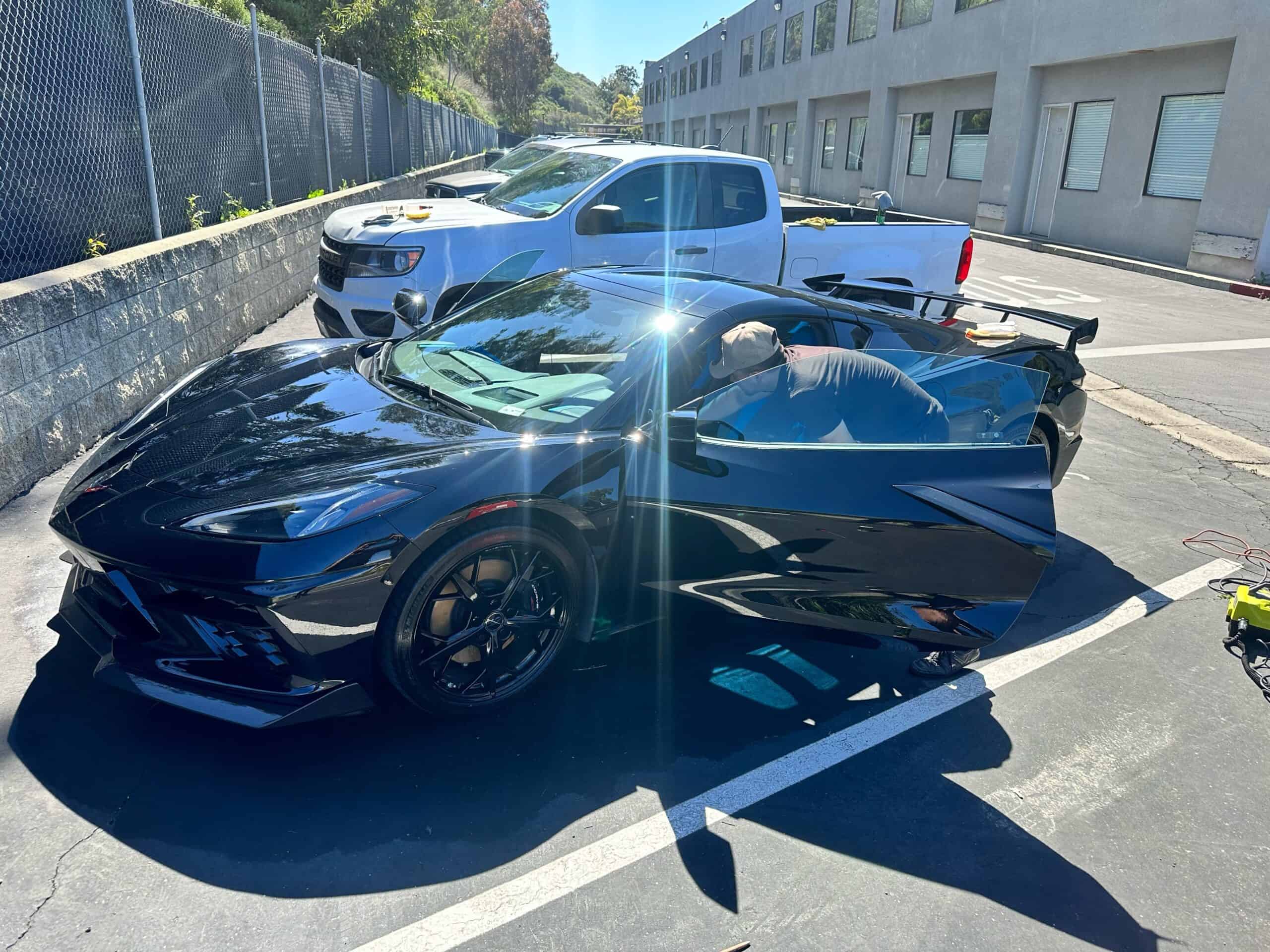 Black Corvette gleaming after a complete inside-and-out mobile detail in Chula Vista